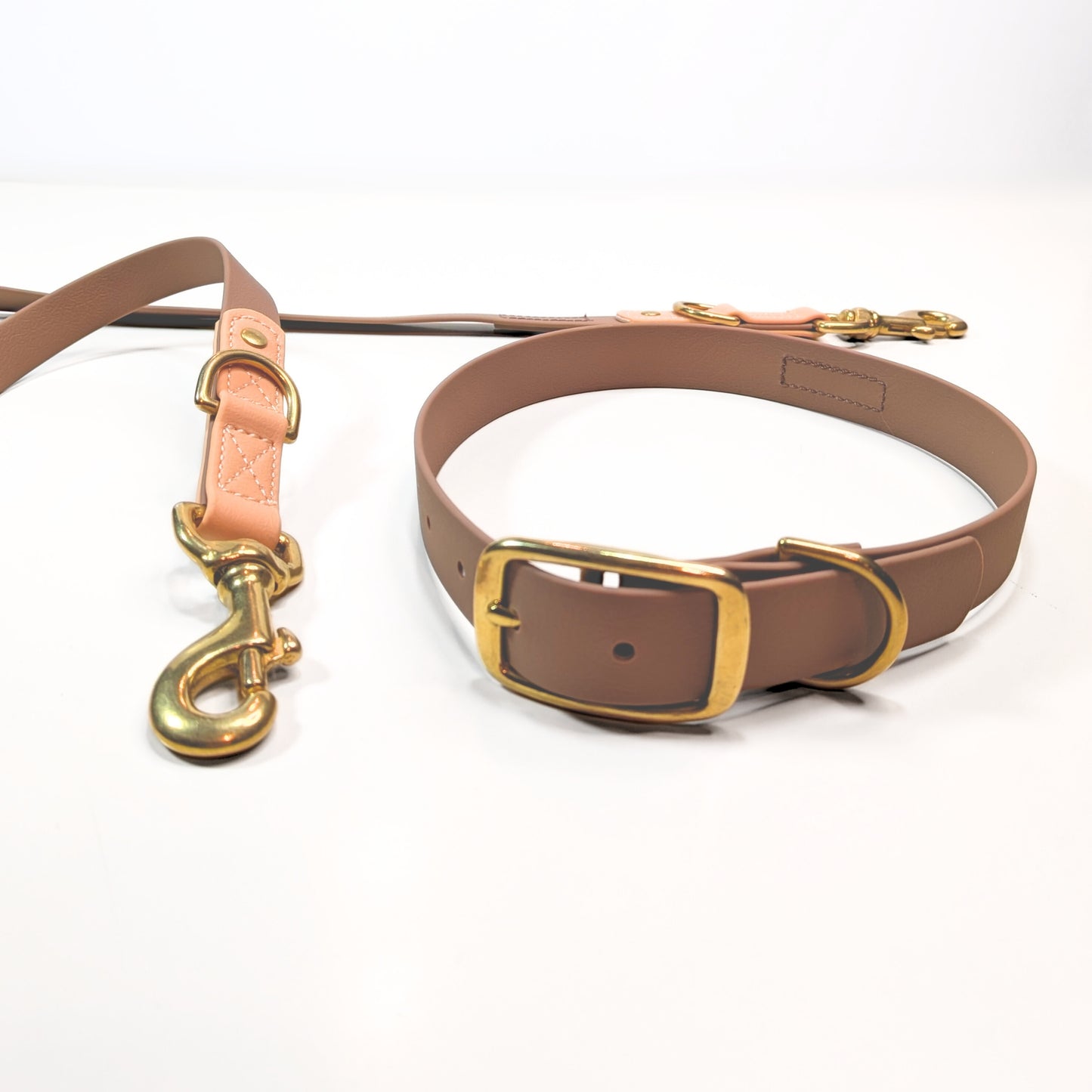 Premium Walk Set | Dog Harness, Leash & Collar - Brown leather collar and matching lead with gold-tone metal fittings on white background