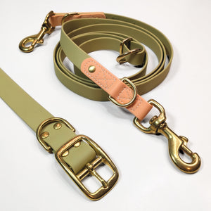 Premium Walk Set | Dog Harness, Leash & Collar - Green with gold hardware and tan leather trim on white background